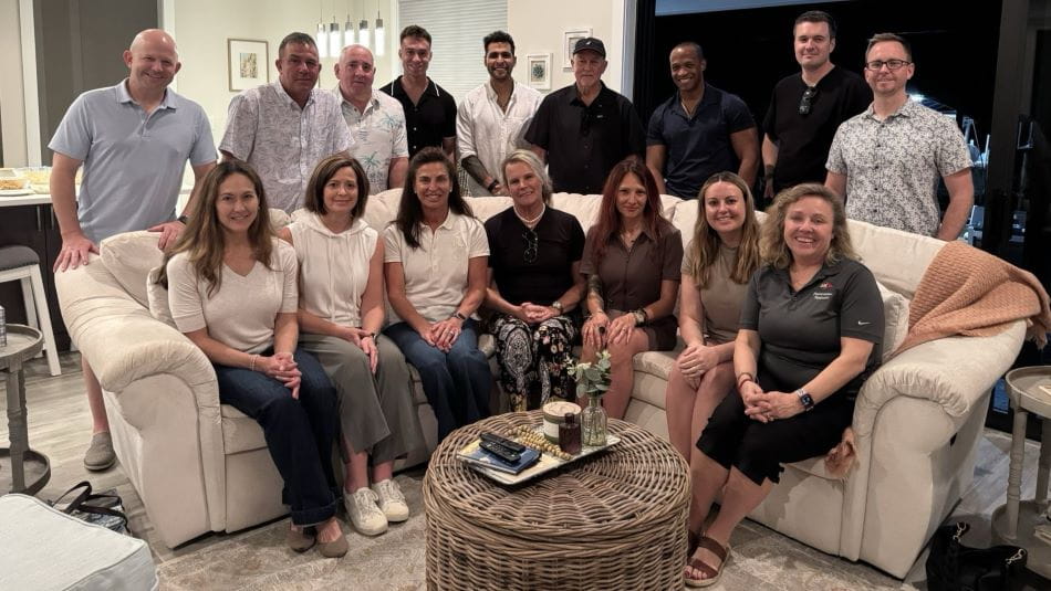 a group of people in a living room