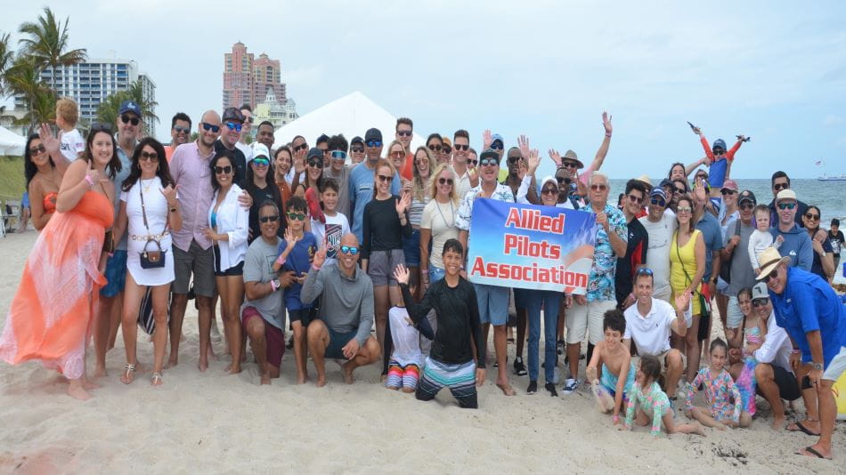 a group of people on a beach