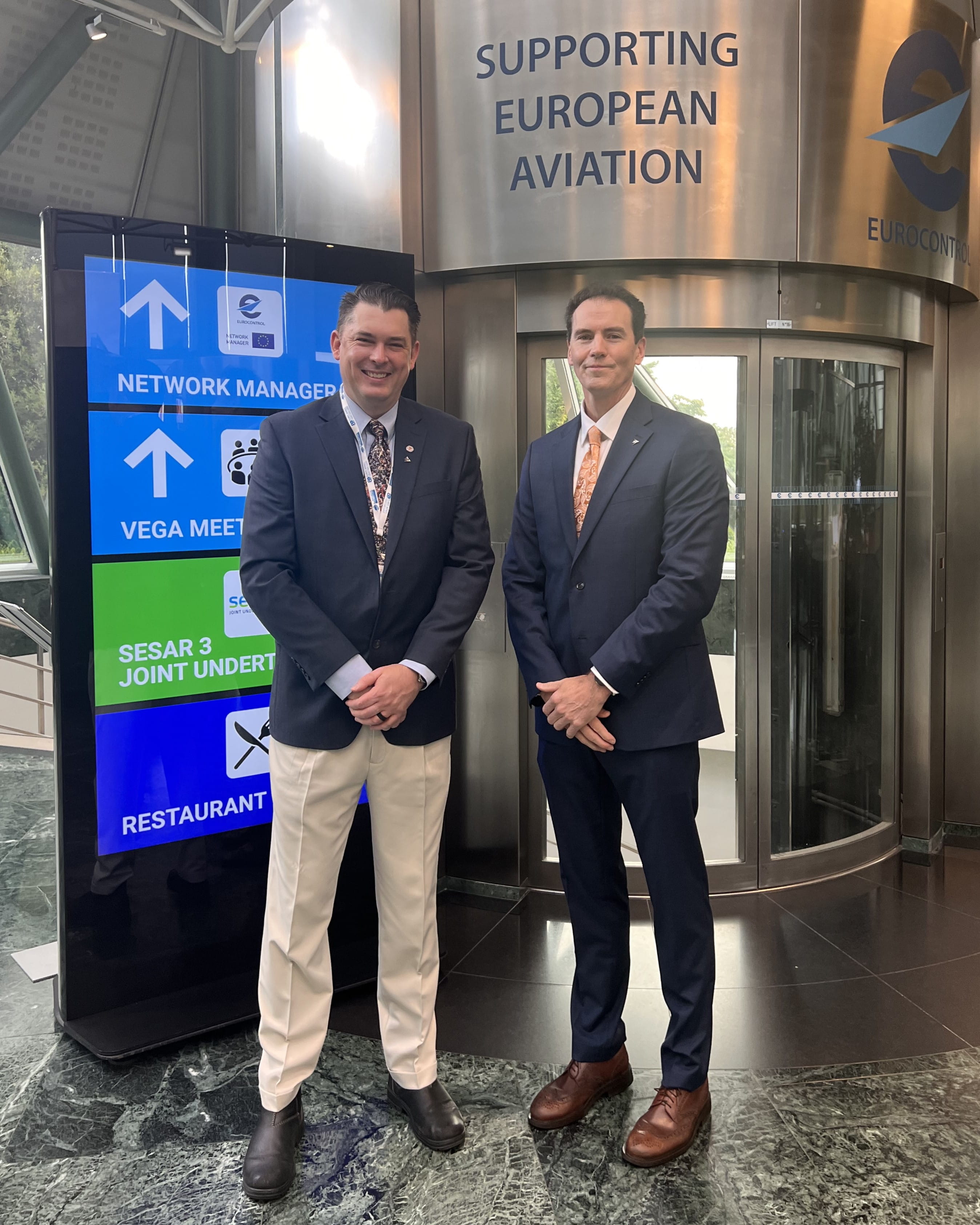 two pilots in suits